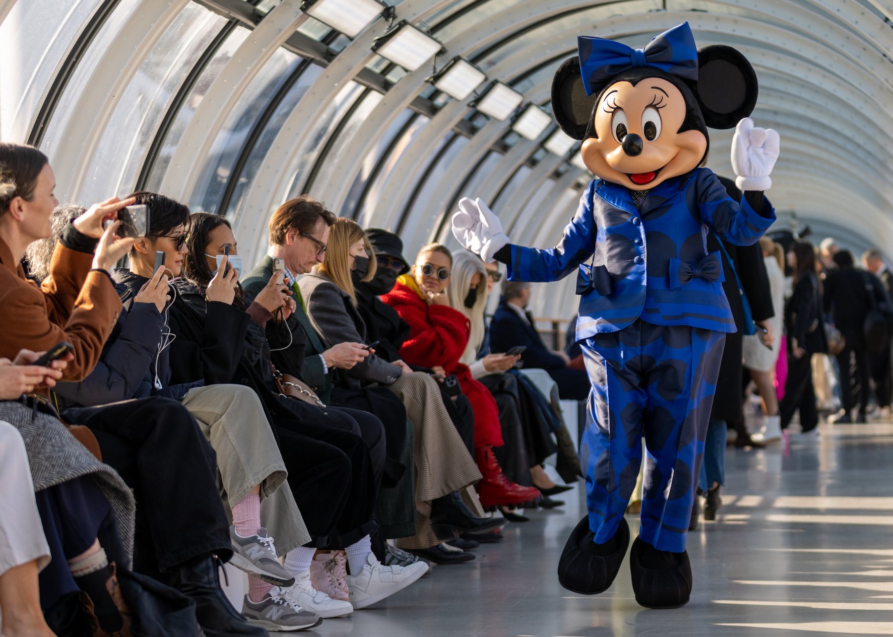 Minnie Mouse attends the Stella McCartney Winter 2022 show as a guest.
